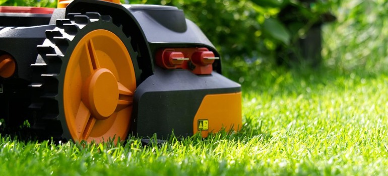 A lawnmower on natural grass.