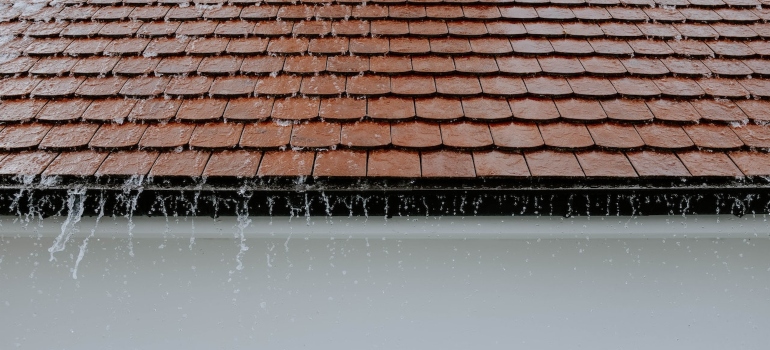 A photo of a roof during heavy rain.